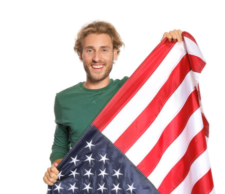 Young man with American flag on white backgroundの写真素材