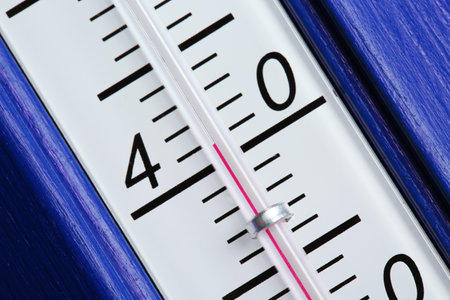 Weather thermometer showing high temperature, closeup view