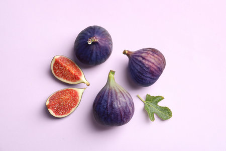 Fresh ripe figs on light background, top viewの写真素材