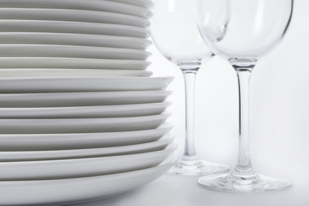 Set of clean tableware on white background, closeup. washing dishesの写真素材
