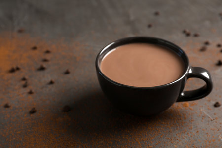 Cup of tasty hot chocolate on table. Space for textの写真素材