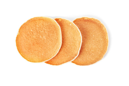 Hot tasty pancakes on white background, top viewの写真素材
