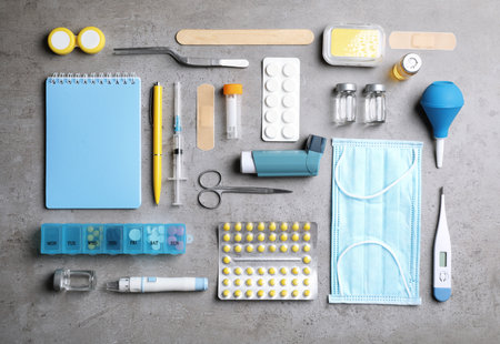 Flat lay composition with medical items on gray backgroundの写真素材