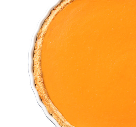 Fresh delicious homemade pumpkin pie on white background, top viewの写真素材