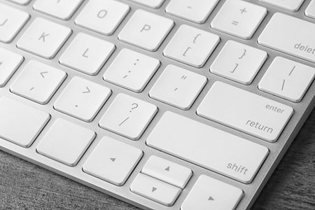 Modern computer keyboard on table, closeup viewの写真素材