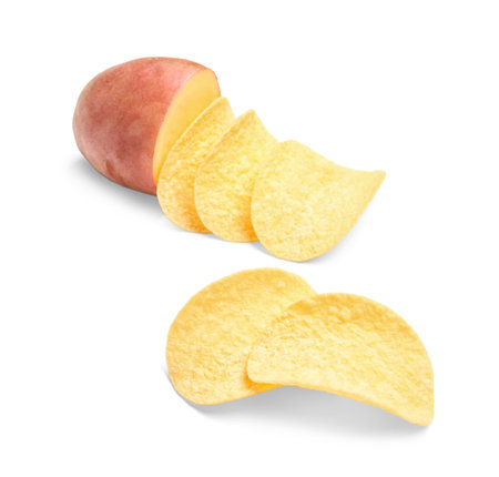 Raw potato and tasty chips on white backgroundの写真素材