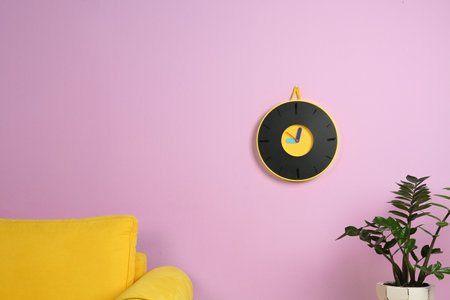 Living room interior with clock and space for text on wall. time management