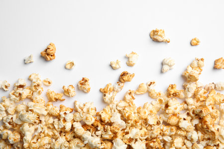 Delicious caramel popcorn on white background, top viewの写真素材