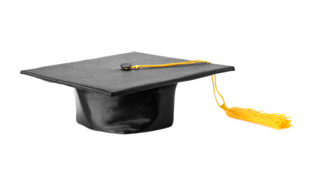 Graduation hat with gold tassel isolated on whiteの写真素材