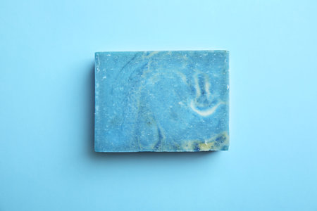 Hand made soap bar on color background, top viewの写真素材