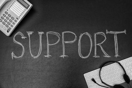 Flat lay composition with word "SUPPORT" on dark background. technical serviceの写真素材