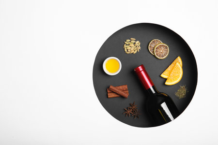 Composition with ingredients for mulled wine on white background, top view. Space for textの写真素材