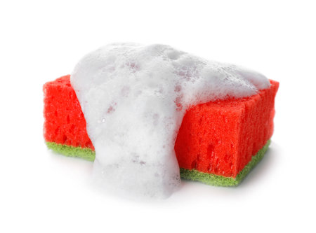 Cleaning sponge with foam for dish washing on white backgroundの写真素材
