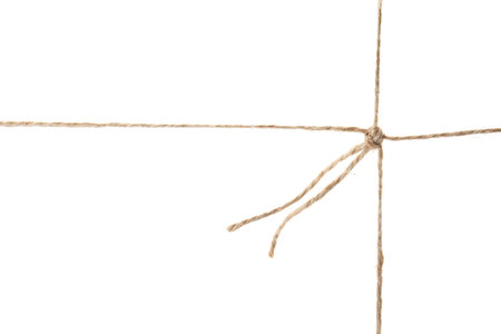 Hemp rope with knot on white background. organic materialの写真素材