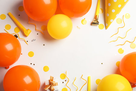 Flat lay composition with air balloons and space for text on white backgroundの写真素材