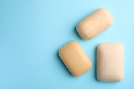 Different soap bars and space for text on color background, top viewの写真素材