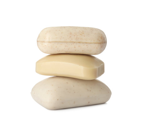Stack of different soap bars on white backgroundの写真素材
