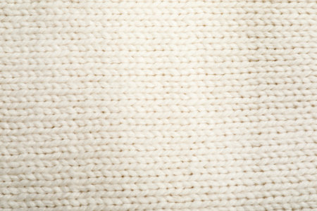 Texture of cozy warm sweater as background, closeup