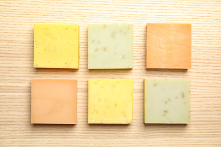 Hand made soap bars on wooden backgroundの写真素材