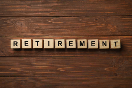 Cubes with word "RETIREMENT" on wooden background. Pension planning conceptの写真素材