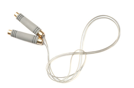 Jump rope on white background, top view