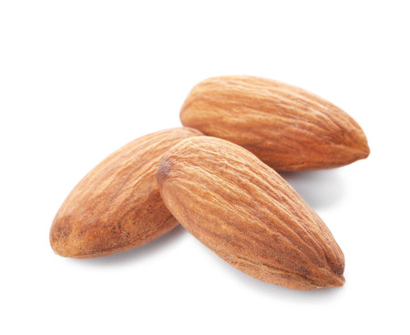 Organic almond nuts on white background. Healthy snackの写真素材