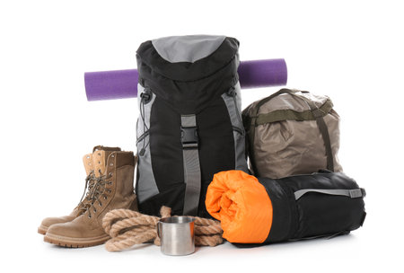 Set of camping equipment with sleeping bag on white backgroundの写真素材
