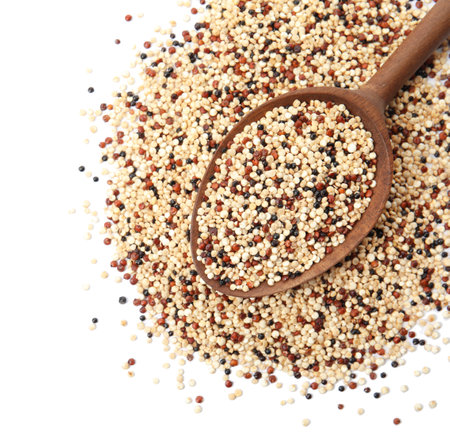 Mixed quinoa seeds and spoon on white background, top view. Space for textの写真素材