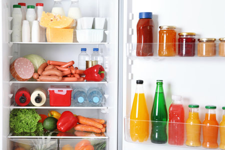 Open refrigerator with many different products, closeupの写真素材