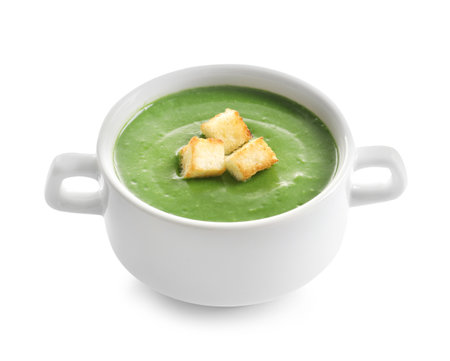 Fresh vegetable detox soup with croutons in dish on white backgroundの写真素材