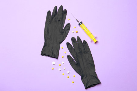 Flat lay composition with medical gloves on color backgroundの写真素材