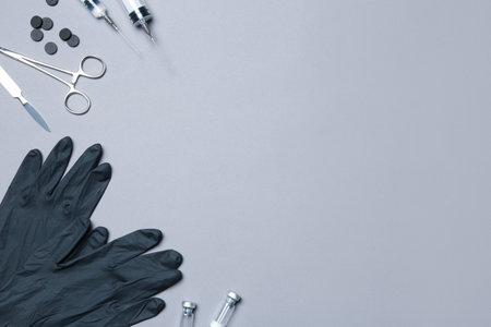 Flat lay composition with medical gloves on color background. Space for textの写真素材