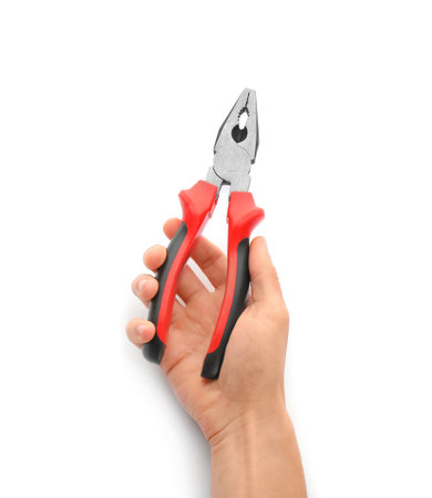 Plumber holding pliers on white background, closeupの写真素材