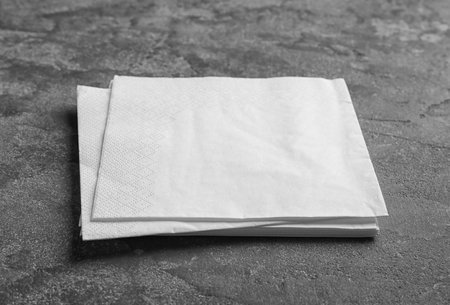 Clean napkins on gray background. personal hygieneの写真素材