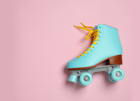 Stylish quad roller skate on color background, top viewの写真素材