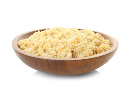 Cooked delicious quinoa in bowl isolated on whiteの写真素材