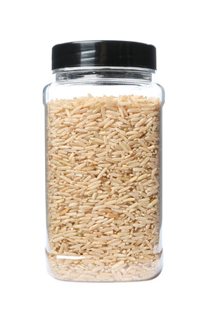 Brown rice in jar, isolated on white. Mock up designの写真素材