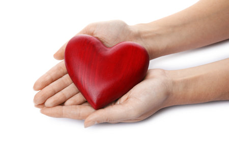 Woman holding red heart on white background, closeup. cardiology conceptの写真素材