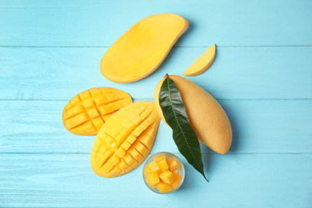 Flat lay composition with mango on wooden backgroundの写真素材