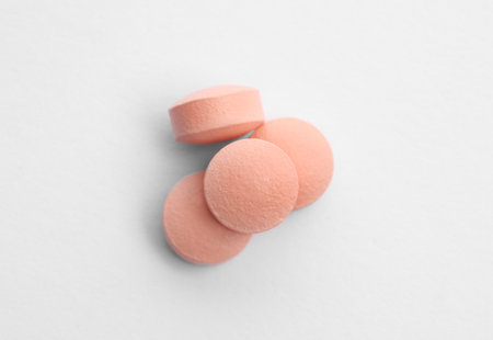 Color pills on white background, top view. medical treatmentの写真素材