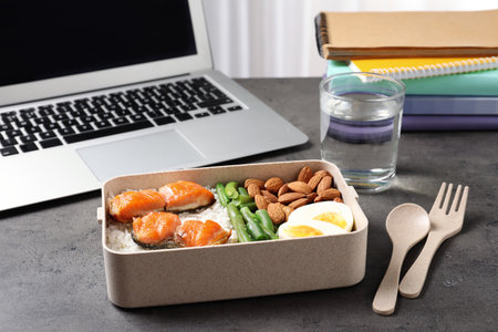 Container with natural protein food on office tableの写真素材