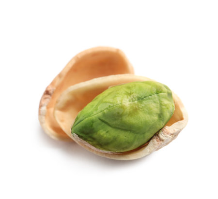 Tasty organic pistachio nut on white background, closeup
