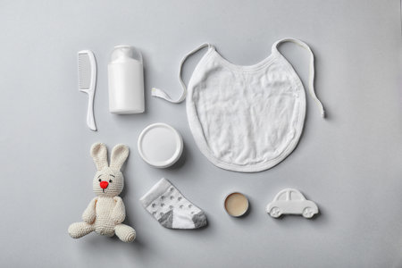 Flat lay composition with baby accessories on gray backgroundの写真素材
