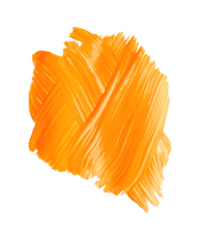 Abstract brushstroke of orange paint isolated on whiteの写真素材