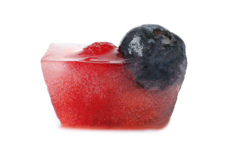 Ice cube with berries on white backgroundの写真素材