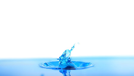 Splash of blue water with drops on white background, closeupの写真素材