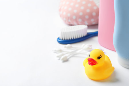 Baby accessories on white background. Space for textの写真素材