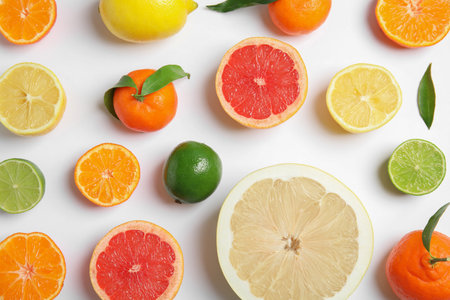 Different citrus fruits on white background, flat layの写真素材