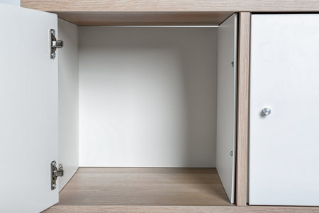 Empty wardrobe compartments, closeup view. Style furnitureの写真素材