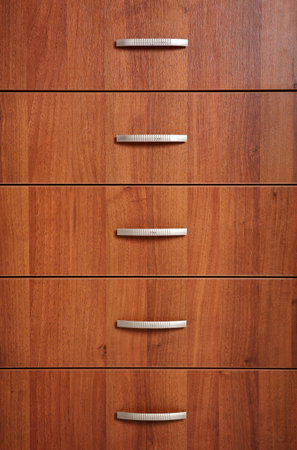 Wooden wardrobe drawers as background, closeup viewの写真素材